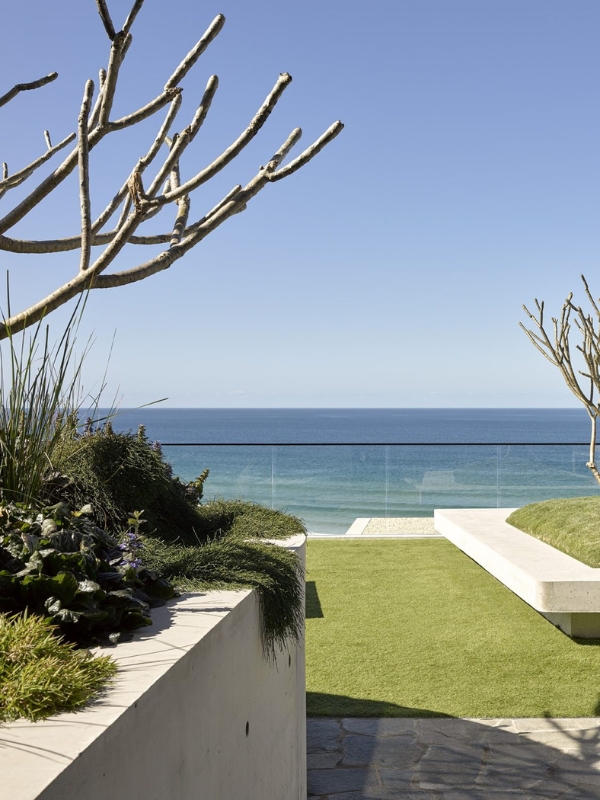 about living style landscape view of ocean beyond garden
